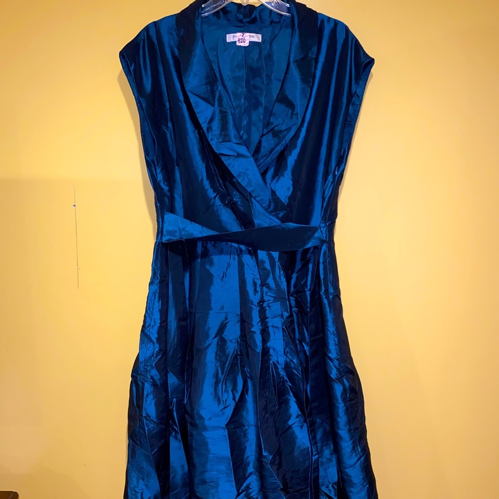 Blue sleeveless dress.